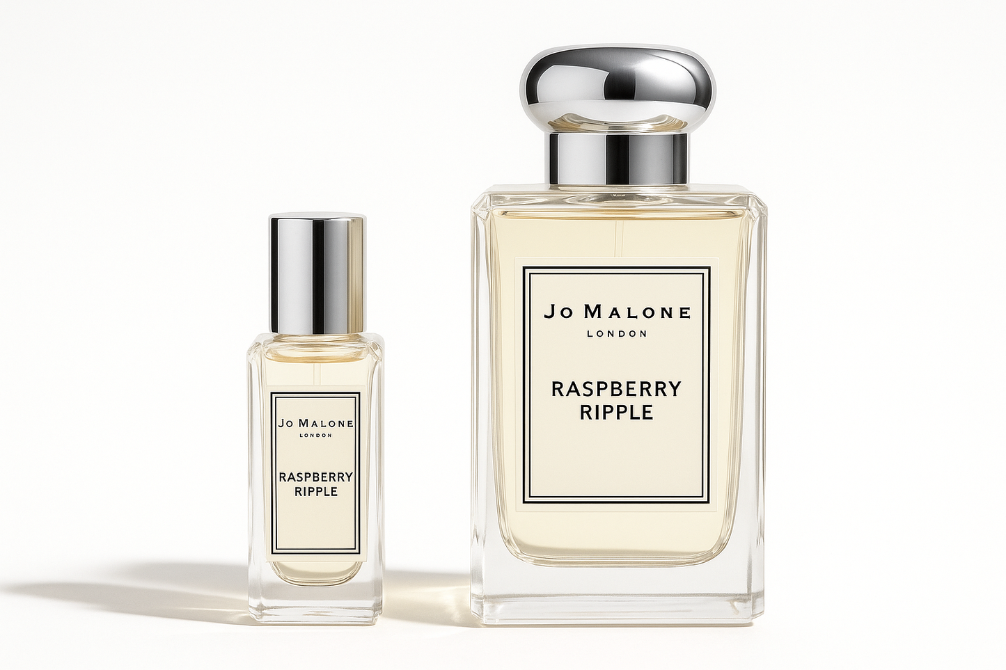 Jo Malone Raspberry Ripple 12ml sample bottle standing next to the 100ml bottle of Jo Malone Raspberry Ripple